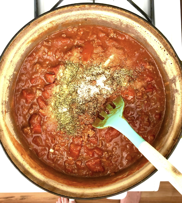 herbs added to sauce